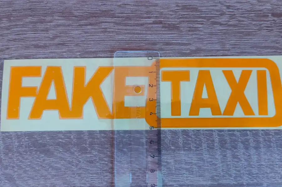 Наклейка на авто FakeTaxi светоотражающая 