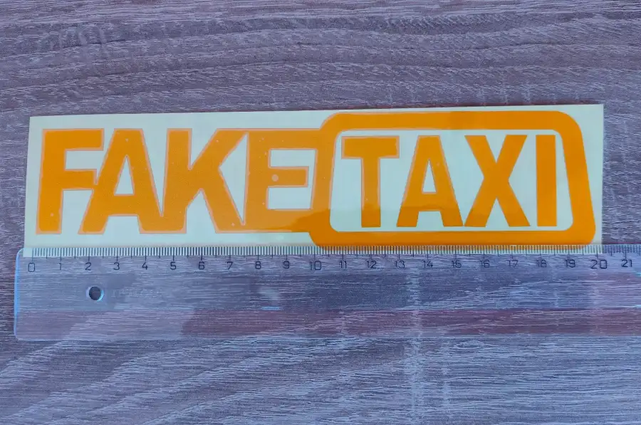 Наклейка на авто FakeTaxi светоотражающая 