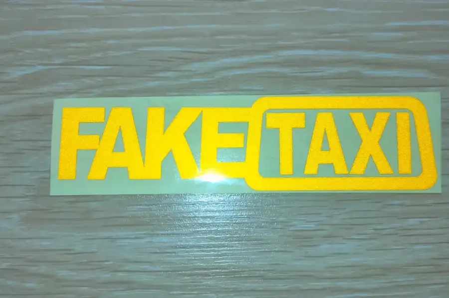 Наклейка на авто-мото FakeTaxi светоотражающая