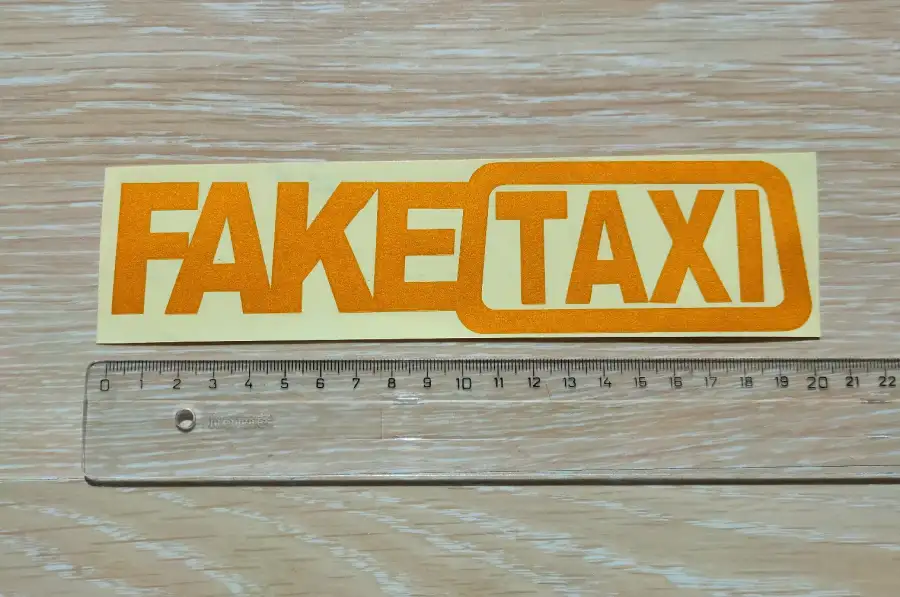 Наклейка на авто-мото FakeTaxi светоотражающая