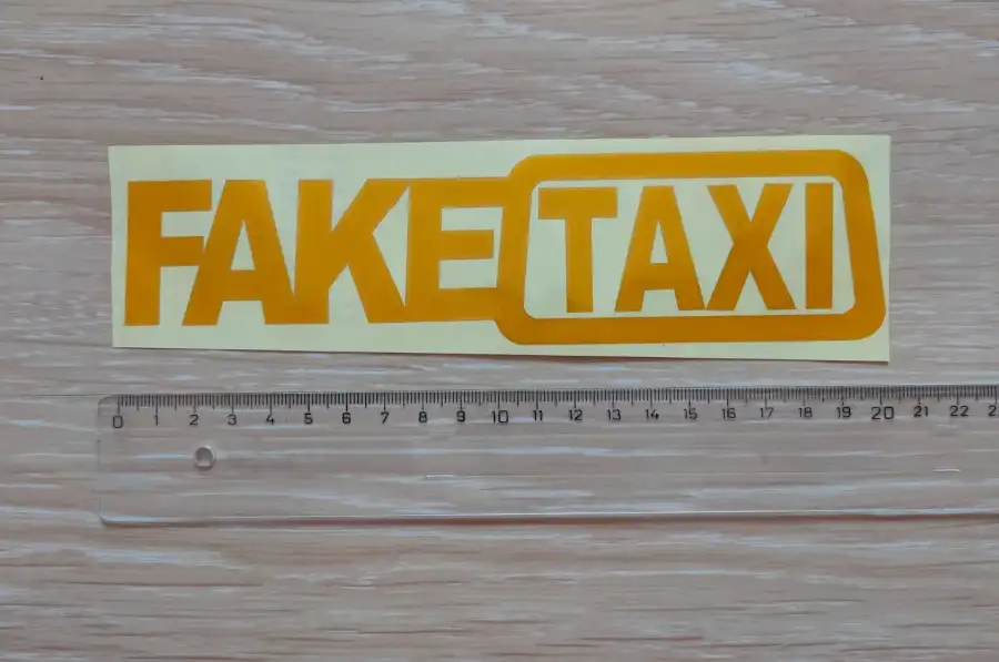 Наклейка на авто FakeTaxi желтая светоотражающая