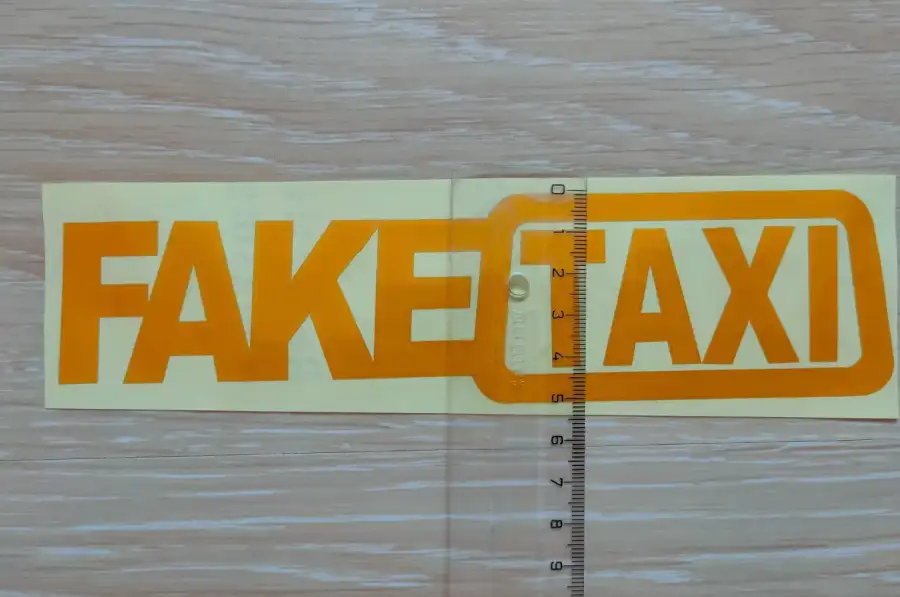 Наклейка на авто FakeTaxi желтая светоотражающая