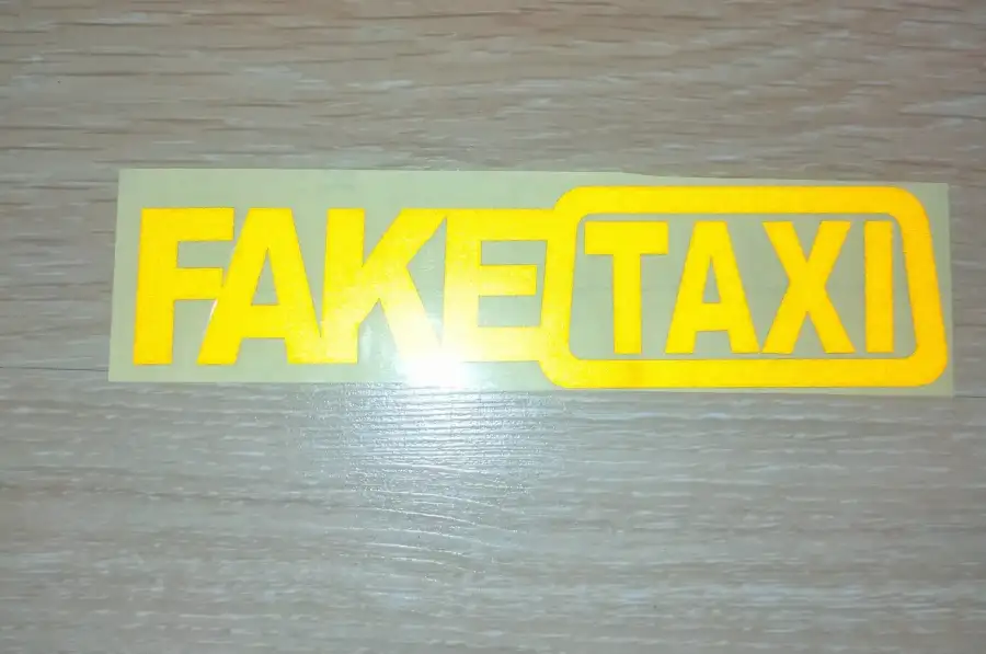 Наклейка FakeTaxi жёлтая светоотражающая на авто-м