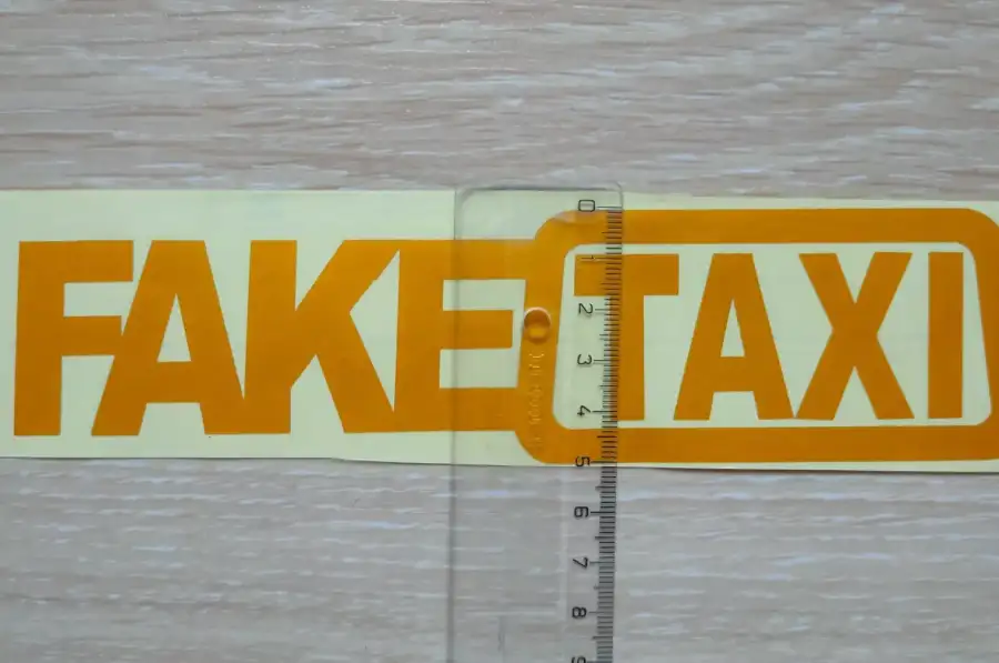 Наклейка FakeTaxi жёлтая светоотражающая на авто-м